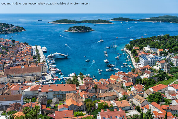 Aerial view of Hvar town and harbour, Croatia Picture Board by Angus McComiskey