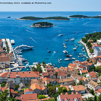 Buy canvas prints of Aerial view of Hvar town and harbour, Croatia by Angus McComiskey