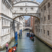 Buy canvas prints of Gondolas under the Bridge of Sighs in Venice by Angus McComiskey