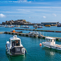Buy canvas prints of St Peter Port harbour in Guernsey, Channel Islands by Angus McComiskey