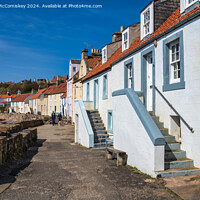 Buy canvas prints of Colourful seafront houses in Pittenweem by Angus McComiskey