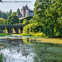 Buy canvas prints of Stone bridge and pond in Drummond Castle Gardens by Angus McComiskey
