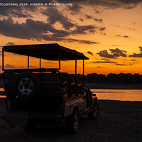 Buy canvas prints of Luangwa River sunset, Zambia by Angus McComiskey