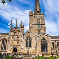 Buy canvas prints of Church of St John the Baptist Burford, Oxfordshire by Angus McComiskey