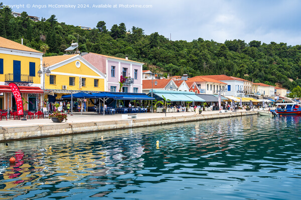 Colourful waterfront buildings at Katakolon Greece Picture Board by Angus McComiskey