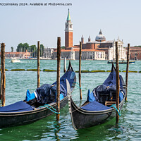Buy canvas prints of Gondolas on waterfront promenade in Venice by Angus McComiskey