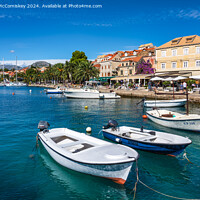 Buy canvas prints of Boats tied up on waterfront of Cavtat in Croatia by Angus McComiskey