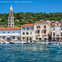 Buy canvas prints of Boats on waterfront of Hvar town, Croatia by Angus McComiskey