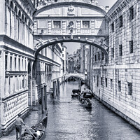 Buy canvas prints of Gondolas under the Bridge of Sighs in Venice (B&W) by Angus McComiskey