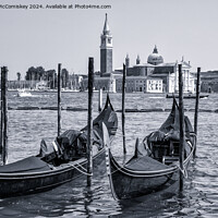 Buy canvas prints of Gondolas on waterfront promenade in Venice (B&W) by Angus McComiskey