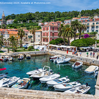 Buy canvas prints of Waterfront of Hvar town, Croatia by Angus McComiskey