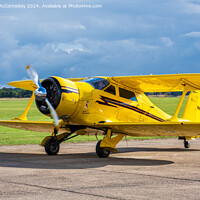 Buy canvas prints of Beech D17S Staggerwing biplane N9405H by Angus McComiskey