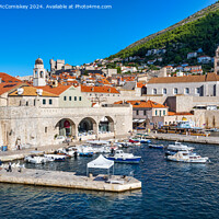 Buy canvas prints of Early morning in Dubrovnik harbour, Croatia by Angus McComiskey