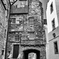 Buy canvas prints of Bakehouse Close, Canongate, Edinburgh (monochrome) by Angus McComiskey