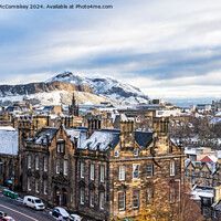 Buy canvas prints of Salisbury Crags and Edinburgh skyline in snow by Angus McComiskey