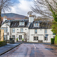 Buy canvas prints of Loch Lomond Arms Hotel in Luss, Scotland by Angus McComiskey
