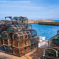 Buy canvas prints of Lobster pots on quayside at St Andrews harbour by Angus McComiskey
