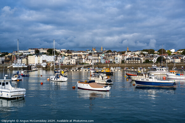 St Peter Port harbour in Guernsey, Channel Islands Picture Board by Angus McComiskey
