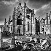 Buy canvas prints of Ruins of Melrose Abbey, Scottish Borders by Angus McComiskey