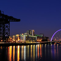 Buy canvas prints of Finnieston Crane and Clyde Arc Bridge at night by Angus McComiskey