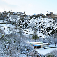Buy canvas prints of Edinburgh Castle and Ross Bandstand in snow by Angus McComiskey