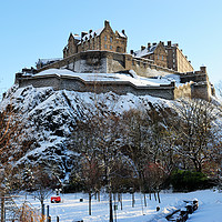 Buy canvas prints of Edinburgh Castle in snow from Princes Street by Angus McComiskey