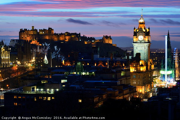 Edinburgh Castle and city skyline at dusk Picture Board by Angus McComiskey