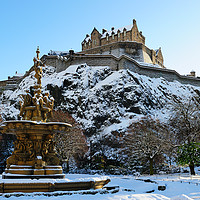 Buy canvas prints of Edinburgh Castle and Ross Fountain in snow by Angus McComiskey