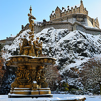 Buy canvas prints of Ross Fountain and Edinburgh Castle in snow by Angus McComiskey