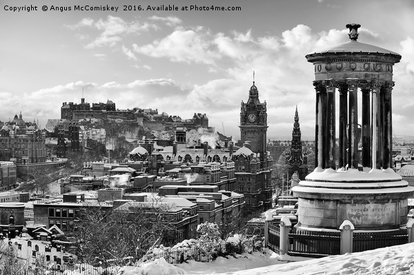 Edinburgh skyline in snow from Calton Hill mono Picture Board by Angus McComiskey