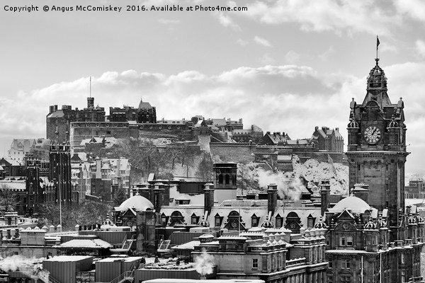 Edinburgh Castle and city skyline in snow mono Picture Board by Angus McComiskey