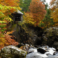Buy canvas prints of Ossian’s Hall and Black Linn Waterfall in autumn by Angus McComiskey