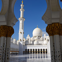 Buy canvas prints of Through arch to Inner Courtyard of Grand Mosque by Angus McComiskey