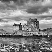 Buy canvas prints of Dramatic sky over Eilean Donan Castle by Angus McComiskey