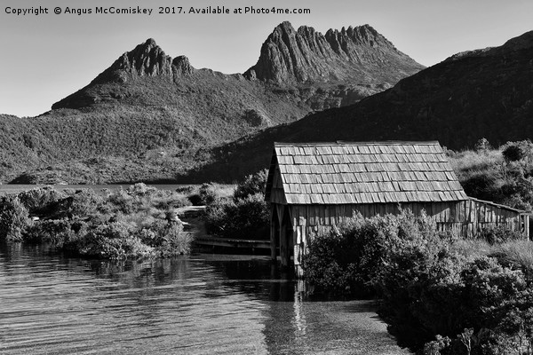 Boat shed with backdrop of Cradle Mountain (mono) Picture Board by Angus McComiskey