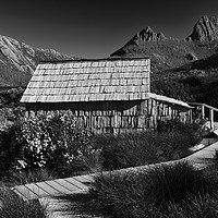 Buy canvas prints of Boat shed on Dove Lake (dark and moody version) by Angus McComiskey