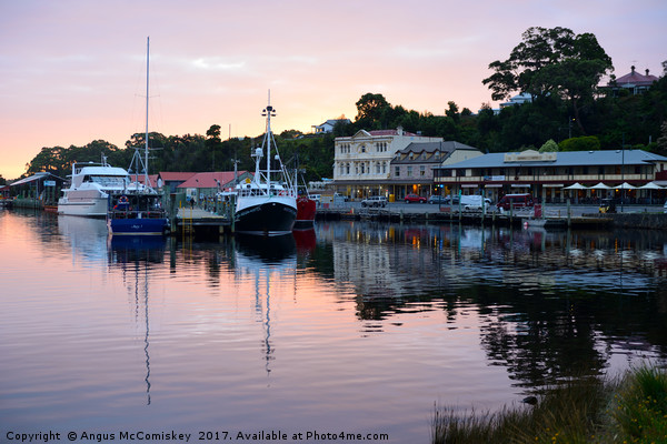 Boats in Strahan seafront Tasmania Picture Board by Angus McComiskey