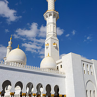 Buy canvas prints of Minaret and colonnade of Grand Mosque Abu Dhabi by Angus McComiskey