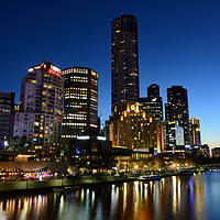 Buy canvas prints of Melbourne Southbank skyline at dusk by Angus McComiskey