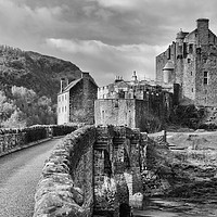 Buy canvas prints of Bridge to Eilean Donan Castle (mono) by Angus McComiskey
