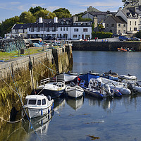 Buy canvas prints of Boats in Roundstone harbour, County Galway by Angus McComiskey