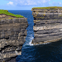 Buy canvas prints of Sea cliffs Downpatrick Head, County Mayo, Ireland by Angus McComiskey