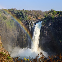 Buy canvas prints of Rainbow over Devil's Cataract - Victoria Falls by Angus McComiskey