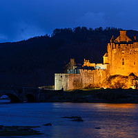 Buy canvas prints of Eilean Donan Castle at twilight by Angus McComiskey