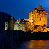 Buy canvas prints of Twilight over Eilean Donan Castle by Angus McComiskey