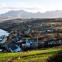 Buy canvas prints of Looking over Carbost to the distant Cuillin Hills by Angus McComiskey