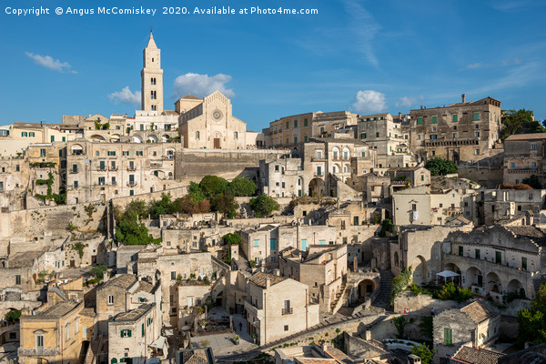 View across Sasso Barisano to Matera Cathedral Picture Board by Angus McComiskey