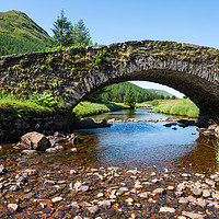 Buy canvas prints of Butterbridge old stone single arched bridge by Angus McComiskey