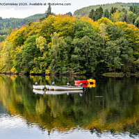Buy canvas prints of Boats moored on Loch Faskally by Angus McComiskey