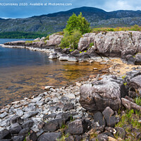 Buy canvas prints of Rocky shoreline of Loch Maree by Angus McComiskey